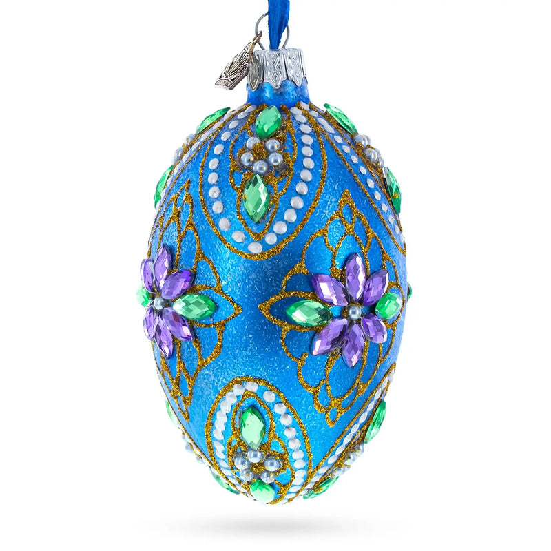 Jeweled Purple Flowers On Blue Glass Egg Ornament