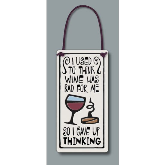 Spooner Creek wine tag, "I used to think wine was bad for me, so I gave up thinking"