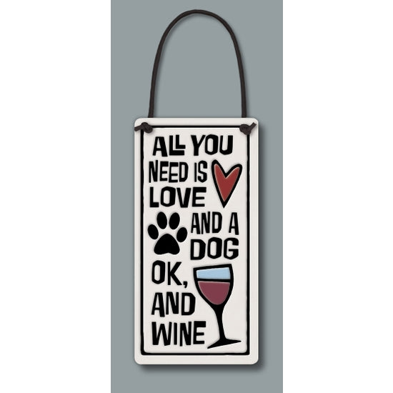 Spooner Creek wine tag, "All you need is love and a dog. Ok, and wine."