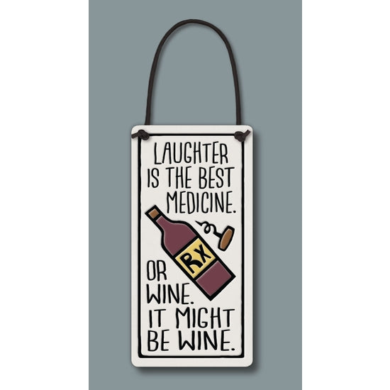 Spooner Creek wine tag, "Laughter is the best medicine. Or wine, it might be wine."