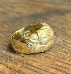 Carol Ackerman carved leaf motif dome ring in 18 karat yellow gold